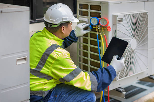 Professional Hvac technician working in Hamilton, AL